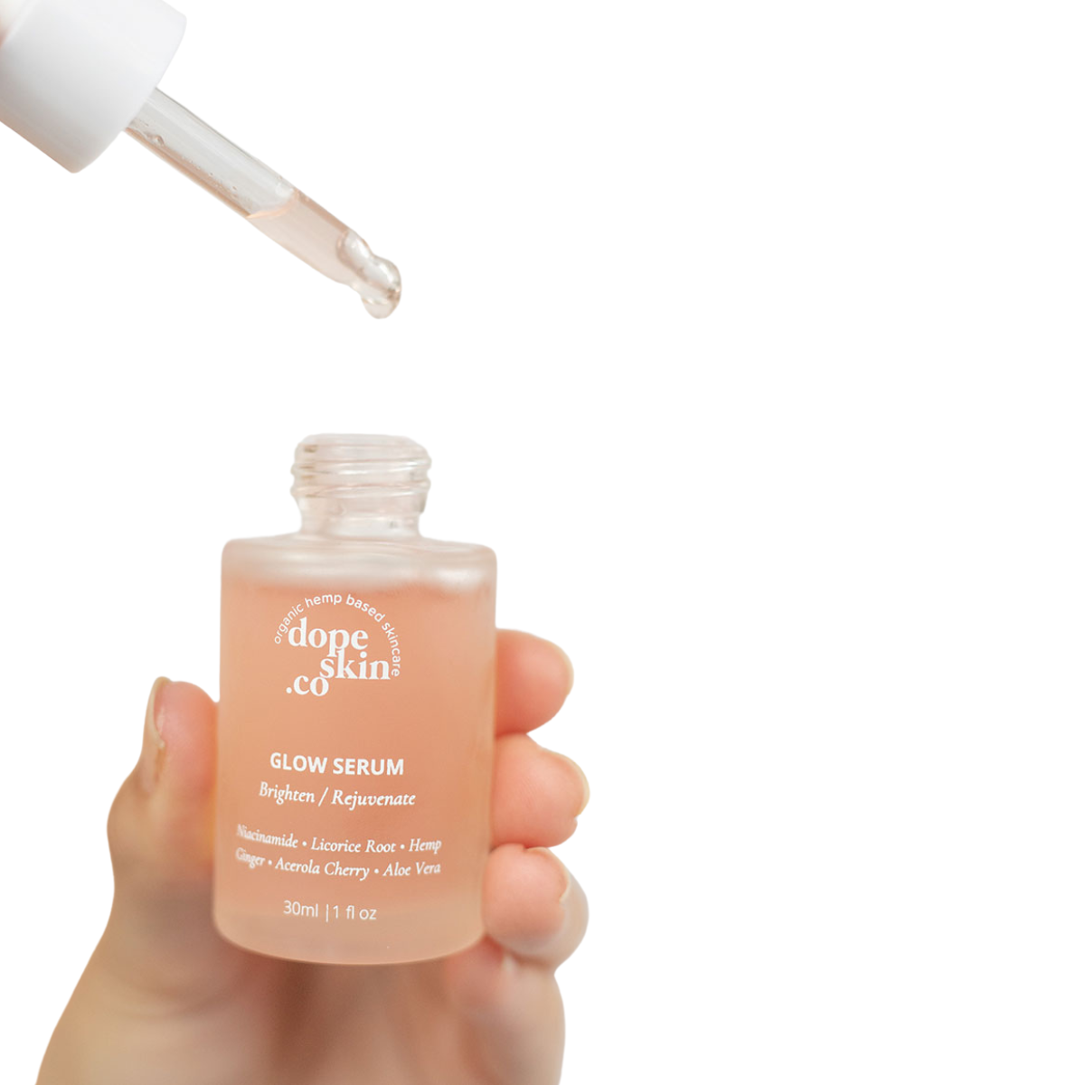 Image of hand holding open Dope Skin Co Glow Serum