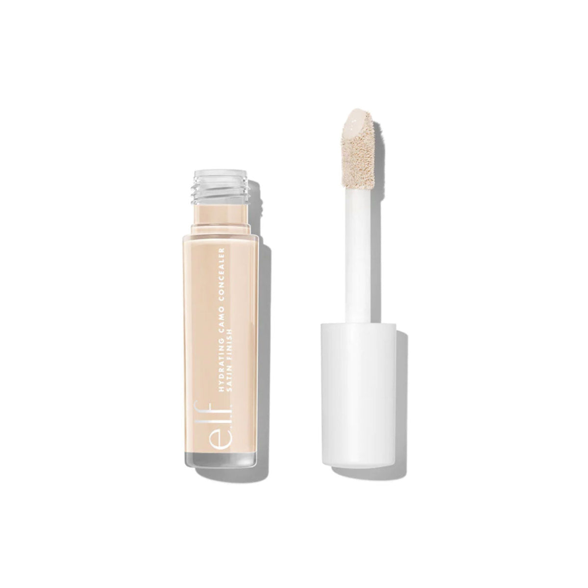 Open plastic tube of elf camo concealer with white lid in shade Fair Warm