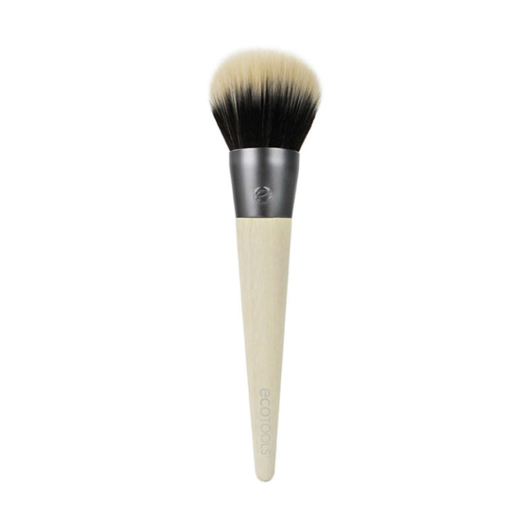 Blending and bronzing brush with black and white bristles on a white background