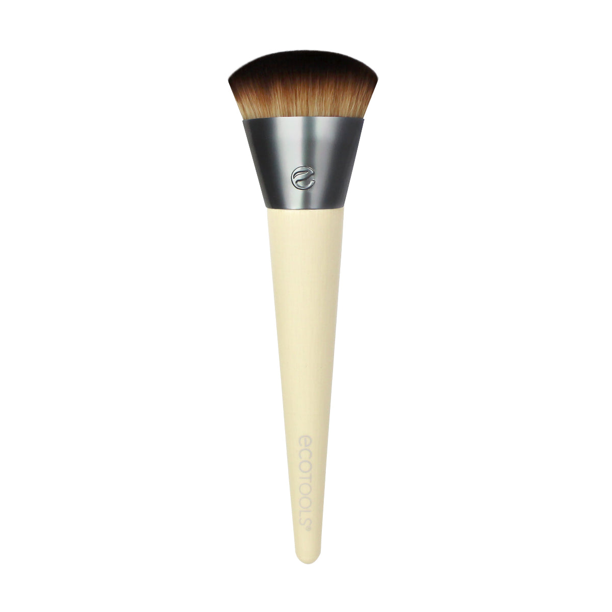 An Eco Tools foundation brush with a beige handle and dome-shaped bristles