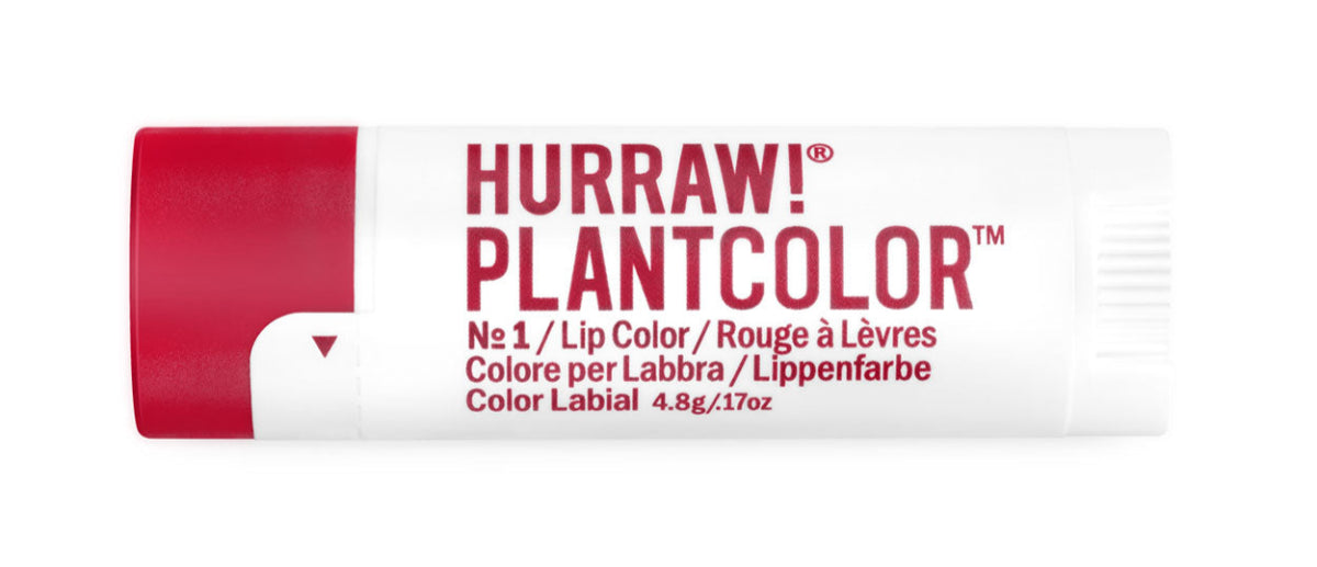 Red Hurraw! Plantcolor lip balm tube on a white background