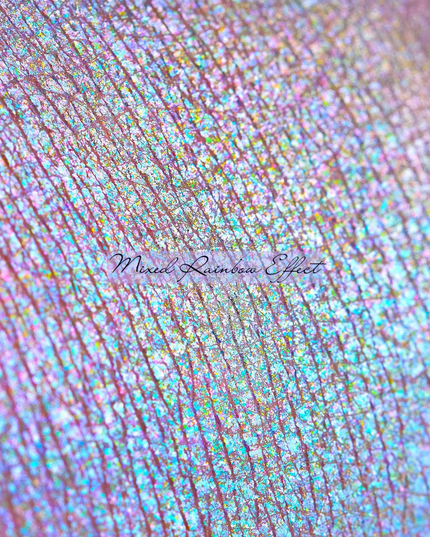 Fingerprint close up with rainbow eyeshadow powder on it