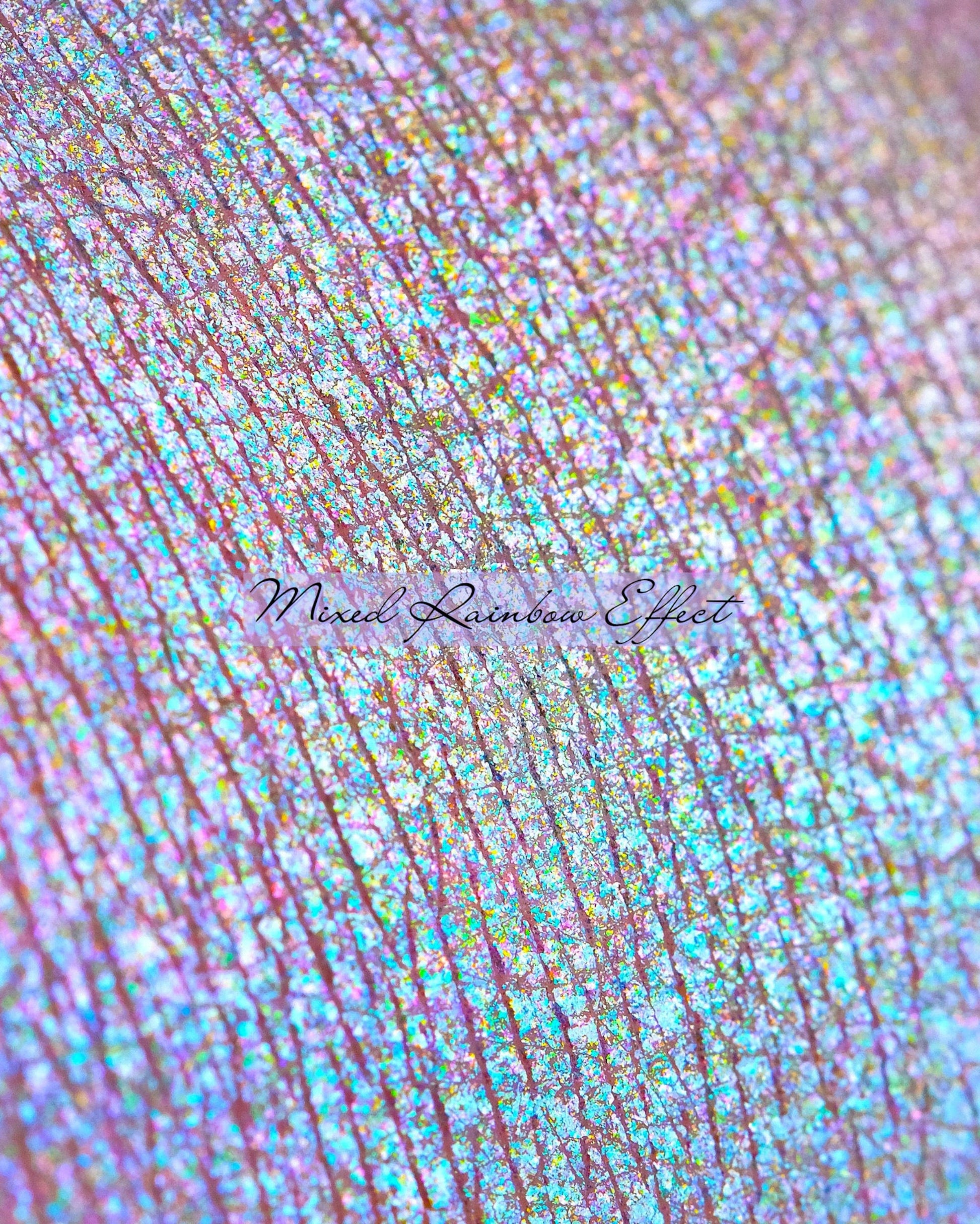 Fingerprint close up with rainbow eyeshadow powder on it