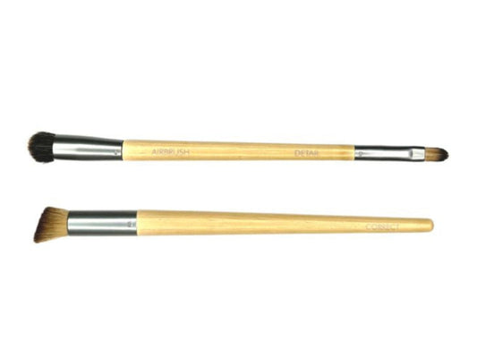 Two Eco Tools makeup brushes with bamboo handles, one is double ended a for concealer application.