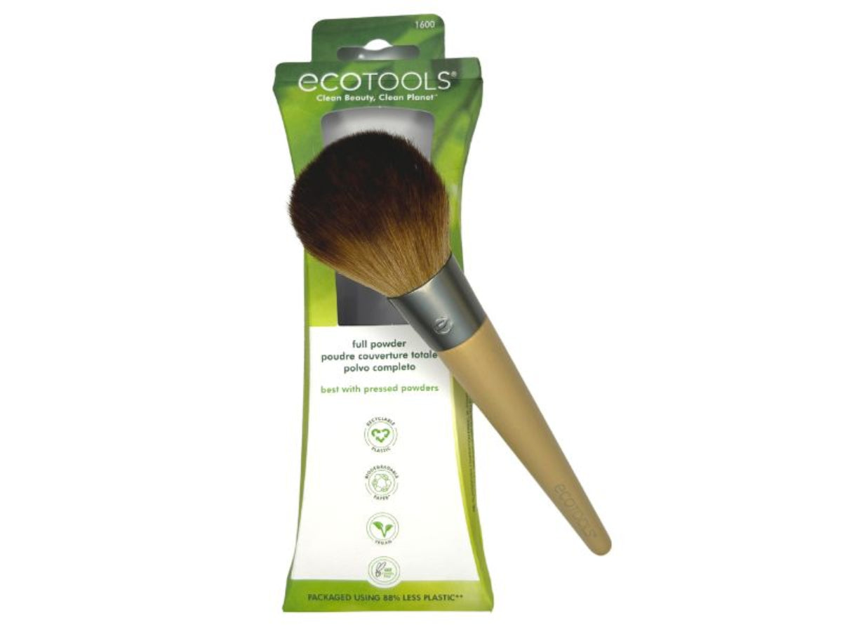 Powder brush with its packaging on a white background