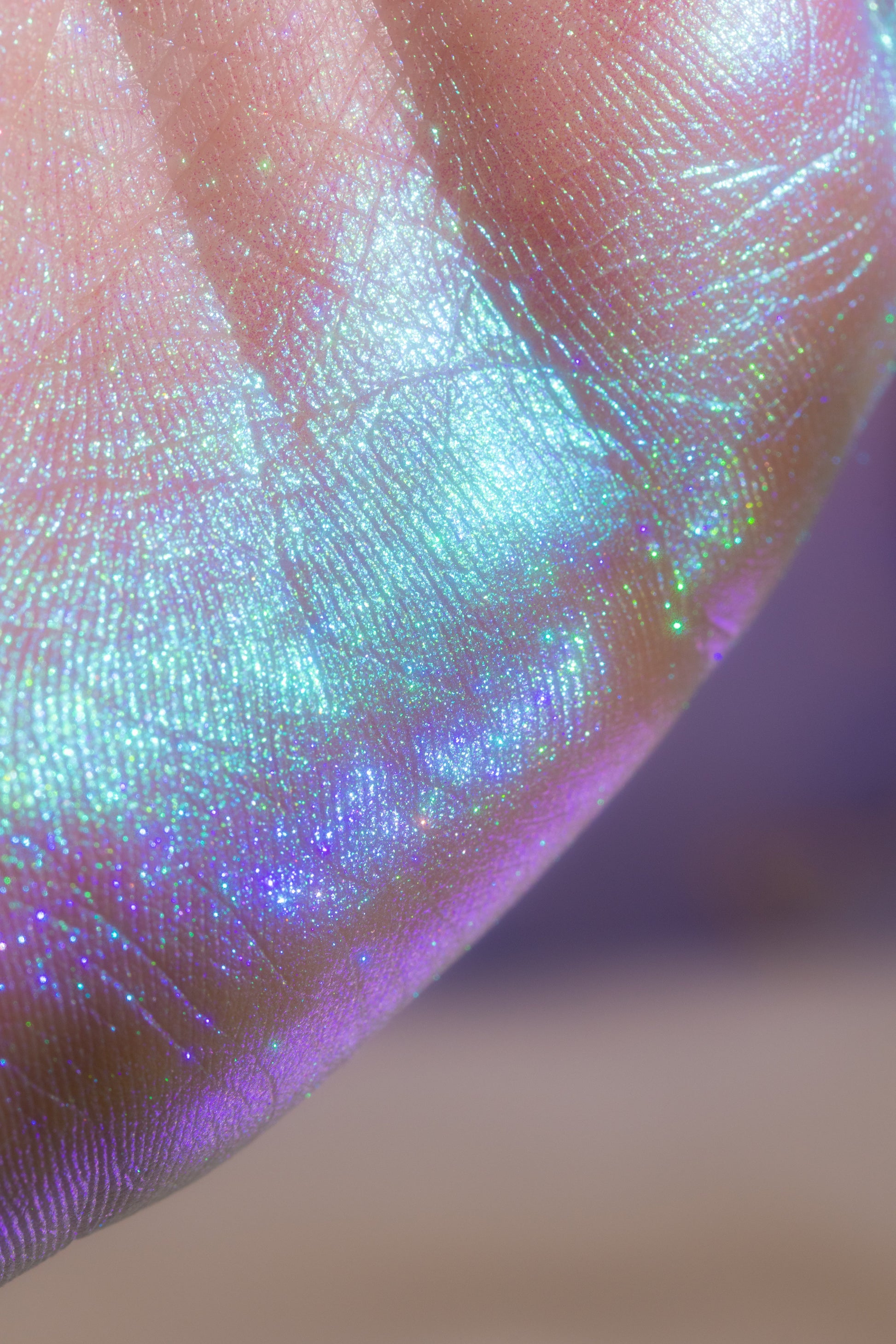 Close-up of a hand with iridescent Dreamer Potion