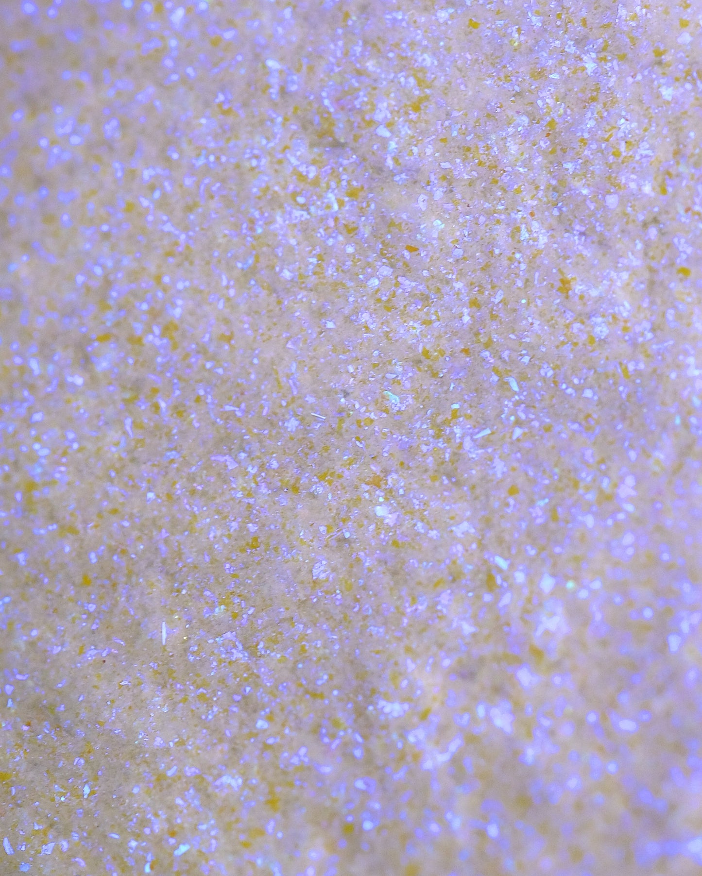 Close-up of a loose opalescent power eyeshadow