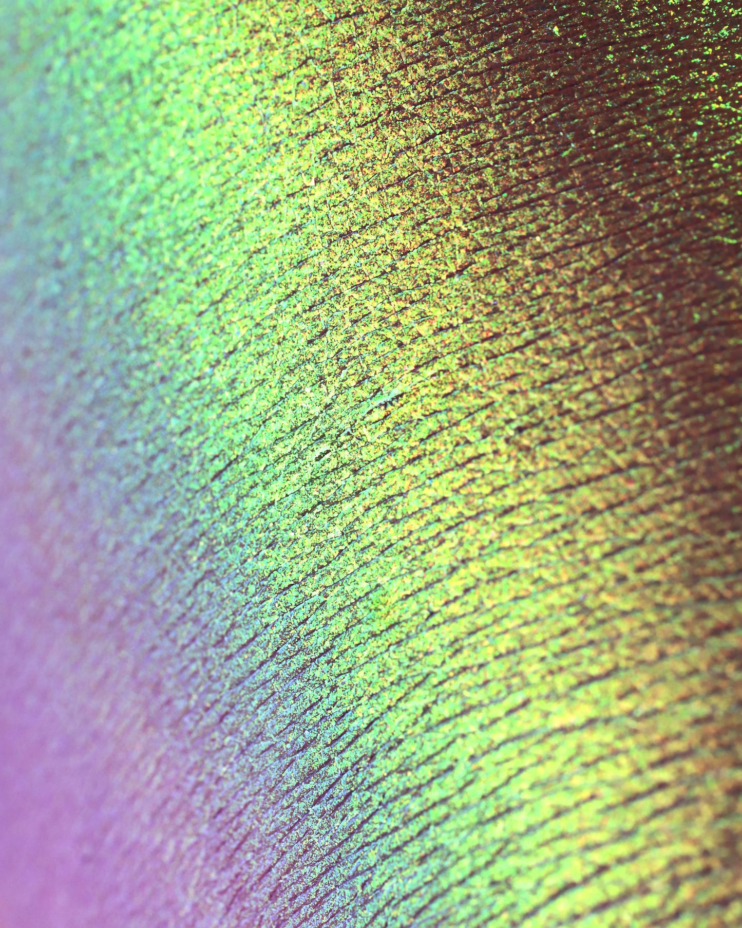 Close-up of a textured surface with multicolor powder on top