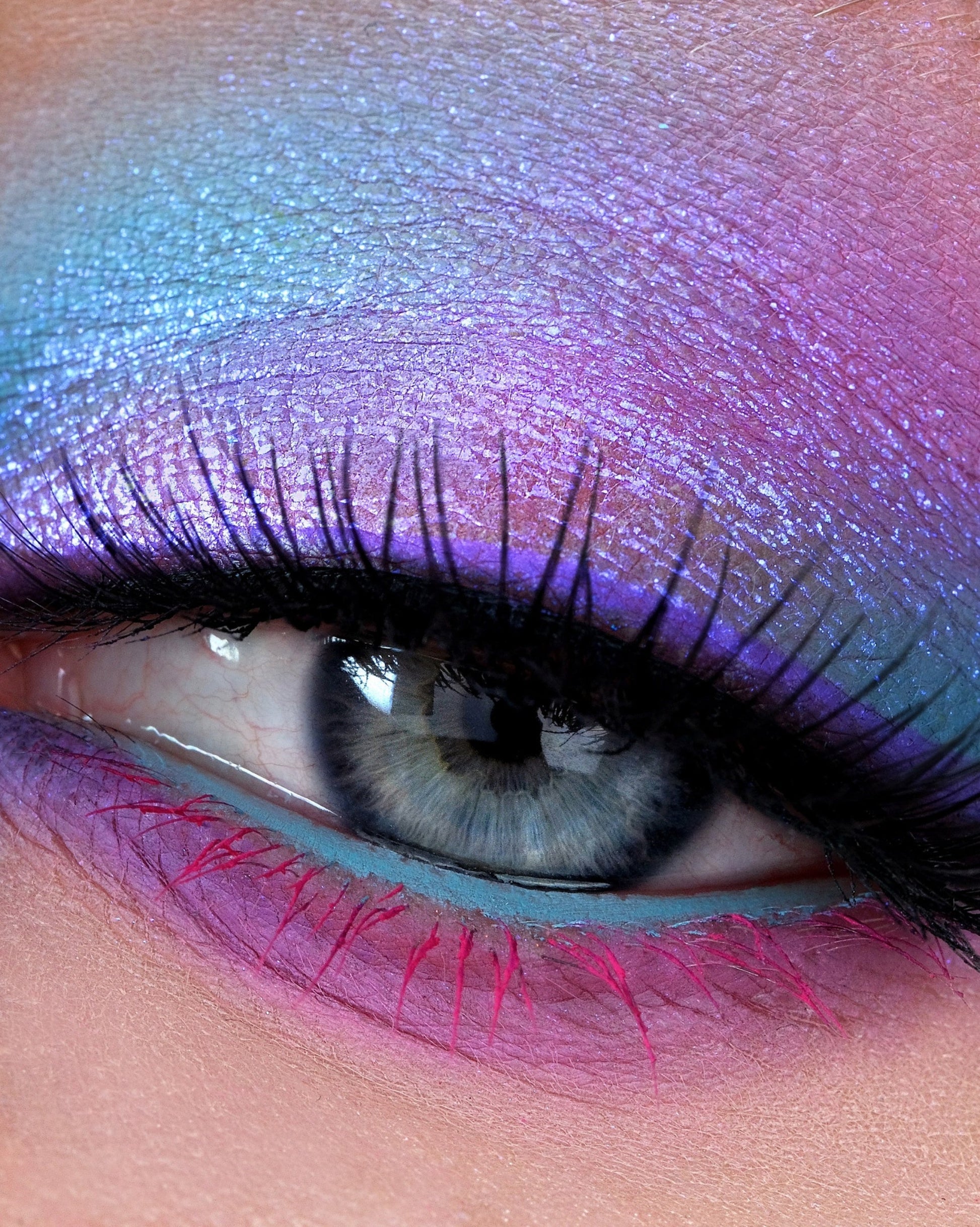 Close-up of an eye with colorful makeup