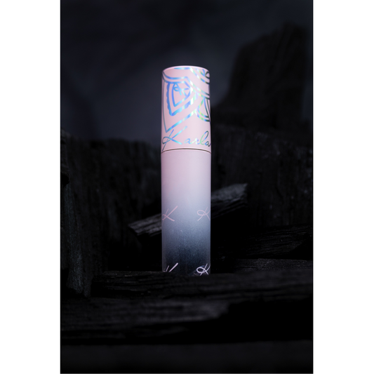 Pink tube with a gradient design on a dark background