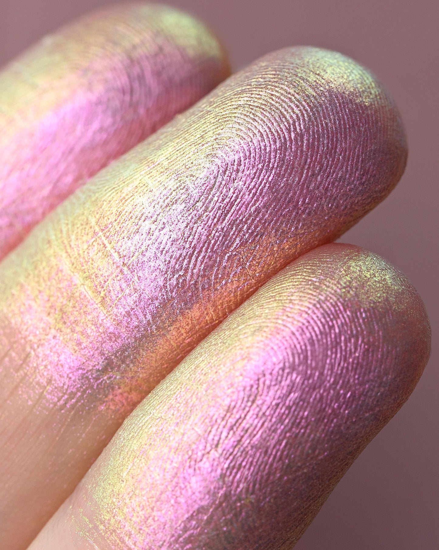 Close up of fingers with Rockabye Baby on them