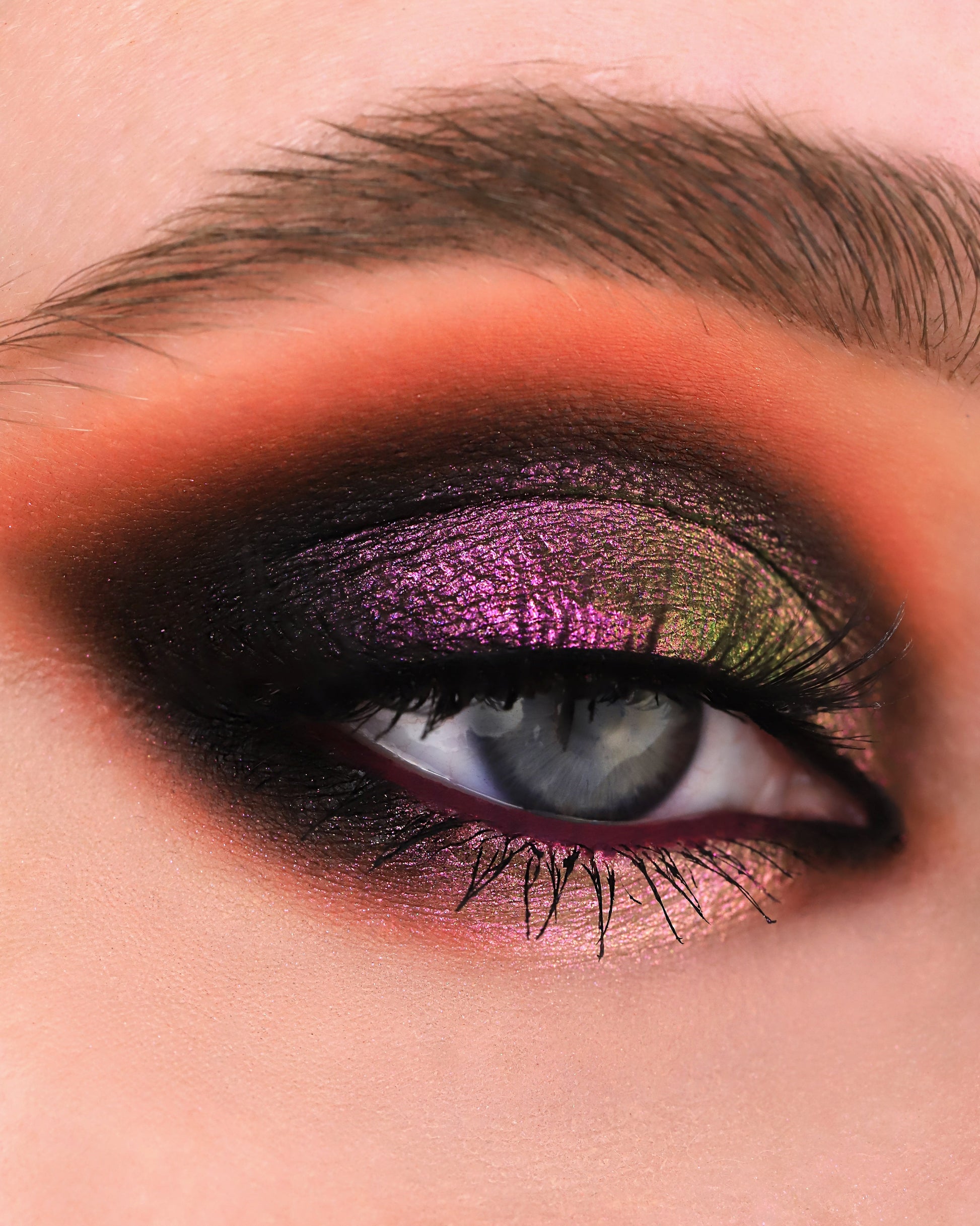 Close-up of a eye with Rockabye Baby on a black eye base